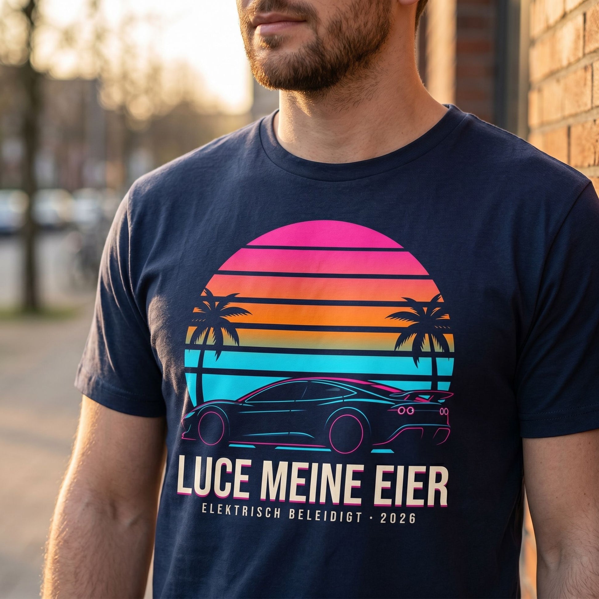Close-up of the Clutcho T-shirt showing detailed neon sunset design, vibrant colors, and cotton fabric texture.