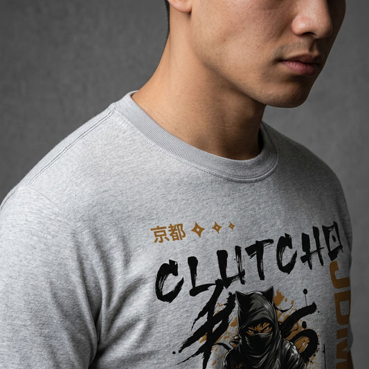 Studio shot emphasizing collar stitching and material quality of CLUTCHO Senpai JDM T-Shirt in grey.