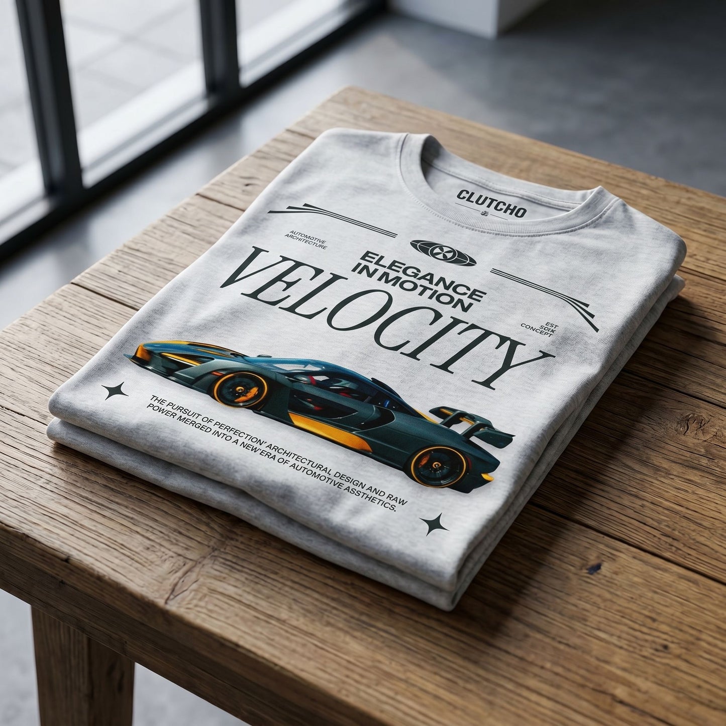 Flat lay of CLUTCHO Velocity Shirt in Heather Grey on a rustic wooden table, emphasizing craftsmanship and fabric quality.